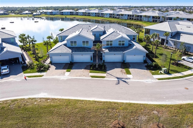 bird's eye view with a water view