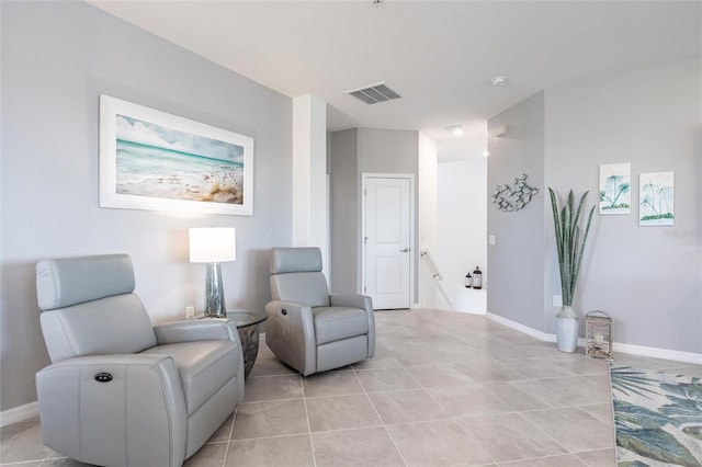 sitting room featuring light tile patterned floors