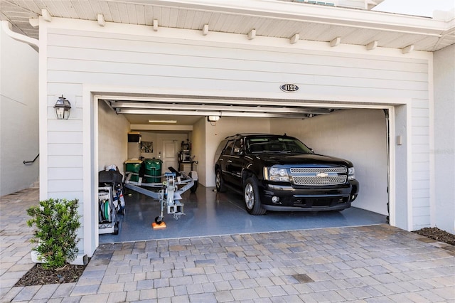 garage featuring a garage door opener