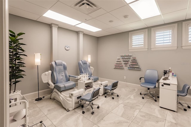 office featuring a paneled ceiling