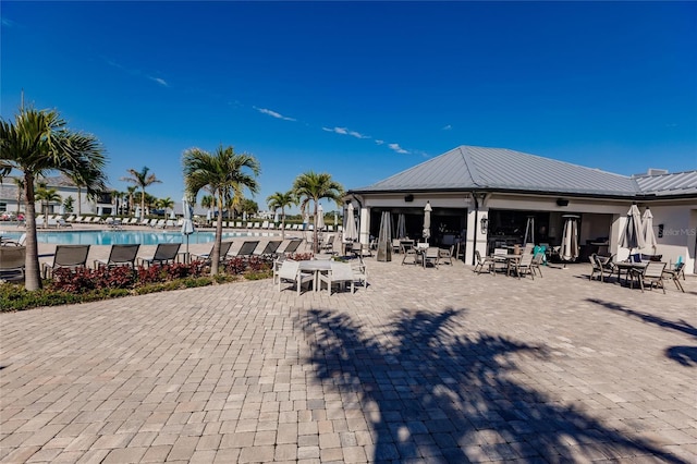 view of swimming pool featuring a patio