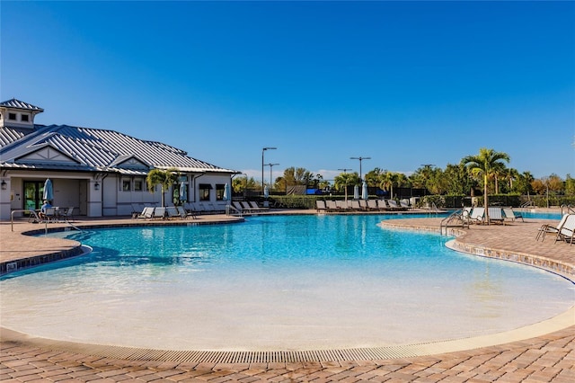 view of pool featuring a patio area