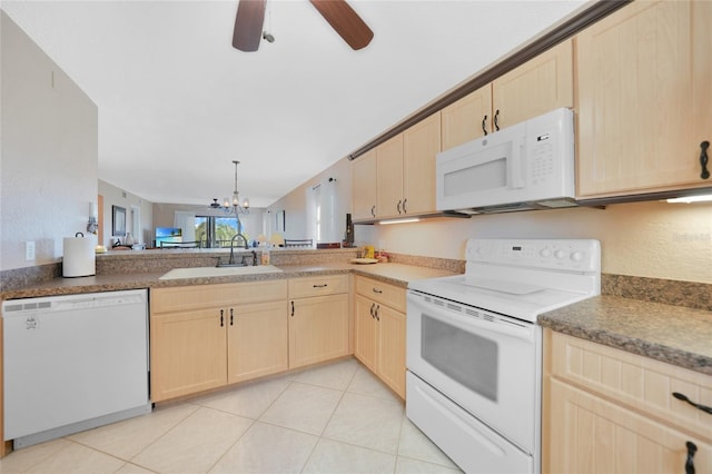 kitchen with ceiling fan with notable chandelier, sink, light brown cabinets, and white appliances