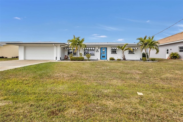 ranch-style home with a garage and a front yard