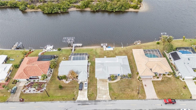 birds eye view of property featuring a water view