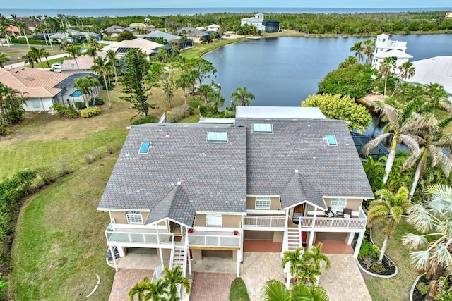 bird's eye view with a water view