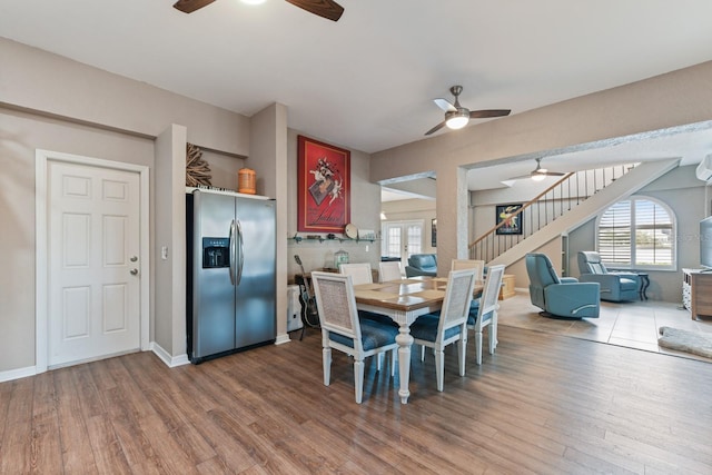 dining room featuring hardwood / wood-style flooring and ceiling fan