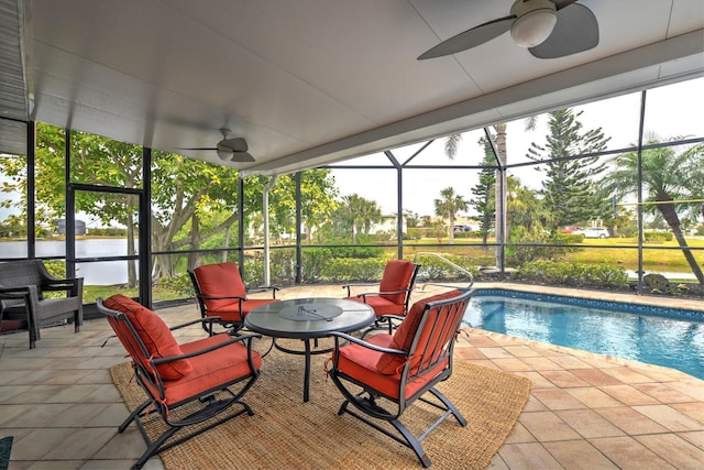 sunroom featuring a wealth of natural light and ceiling fan