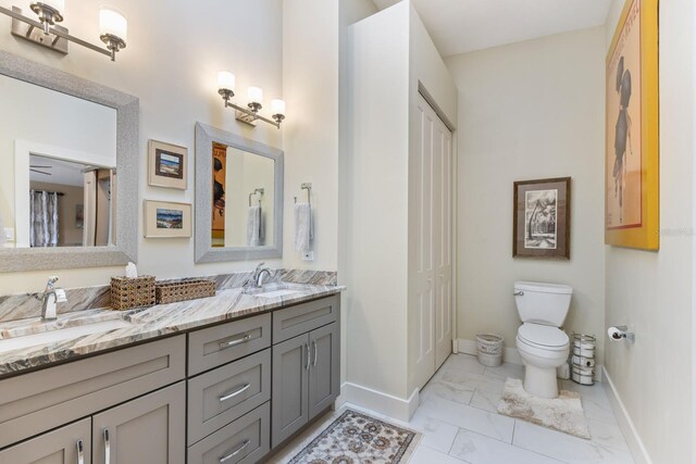 bathroom with vanity and toilet