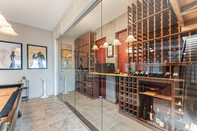 wine room featuring tile patterned floors