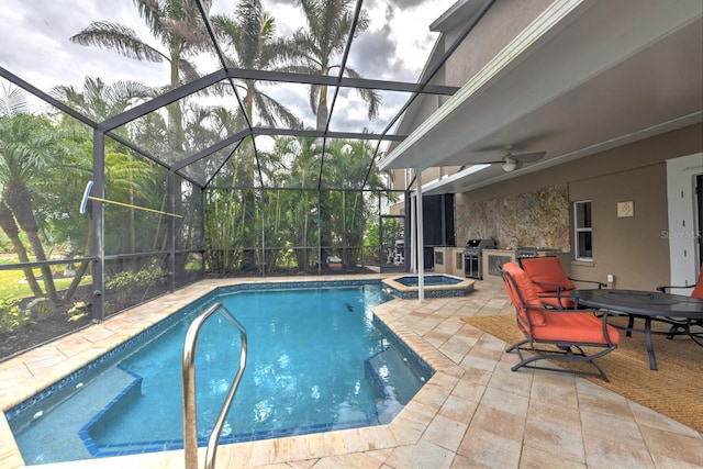 view of swimming pool with a lanai, a patio, area for grilling, grilling area, and an in ground hot tub