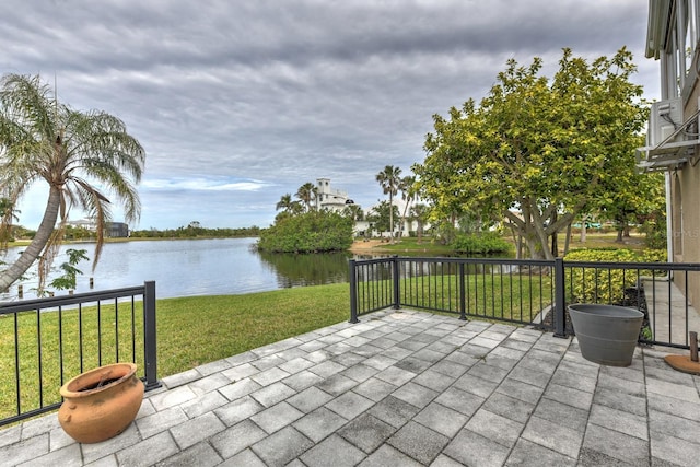 view of patio featuring a water view