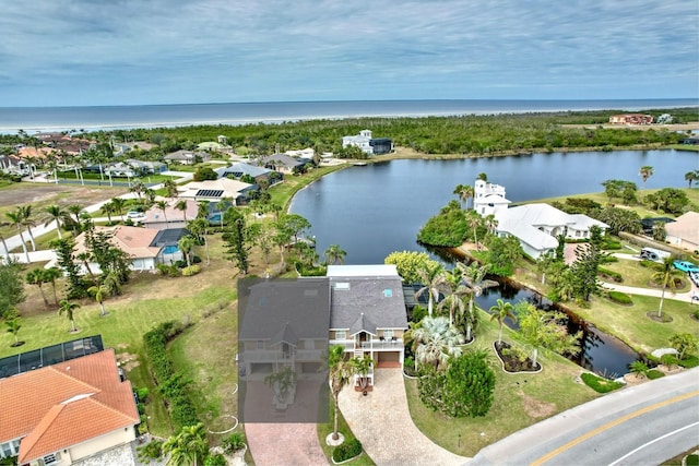 drone / aerial view with a water view