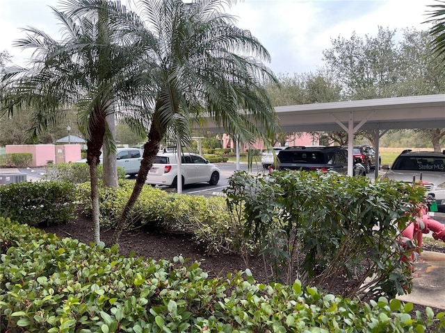 view of car parking featuring a carport