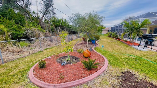 view of yard featuring glass enclosure