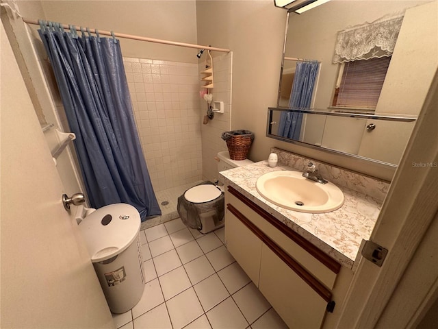 bathroom with vanity, tile patterned flooring, a shower with curtain, and toilet