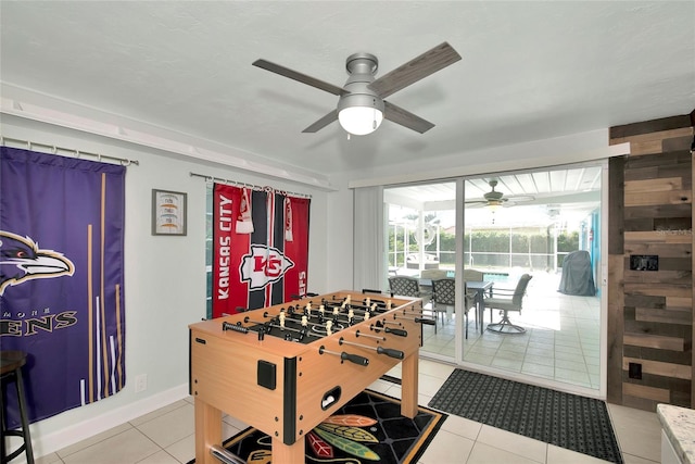 game room featuring tile patterned floors and ceiling fan