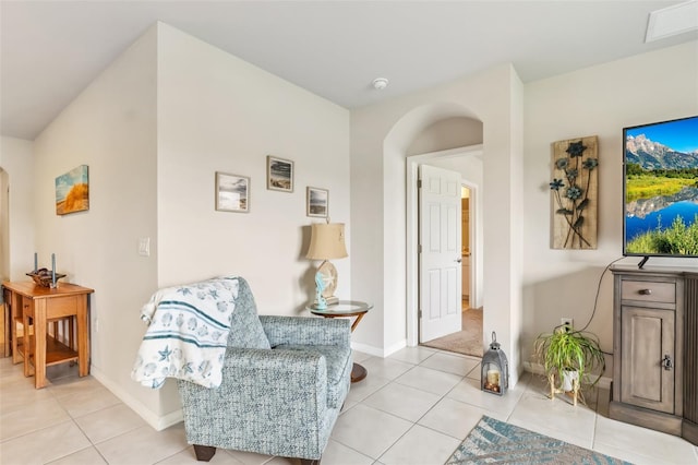 sitting room with light tile patterned flooring