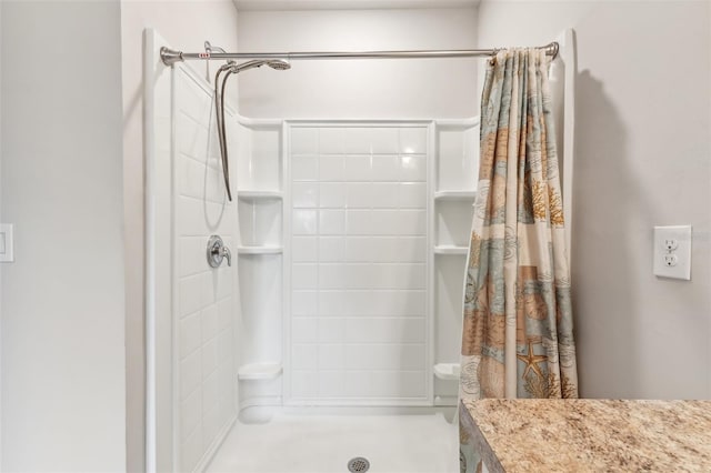 bathroom featuring curtained shower