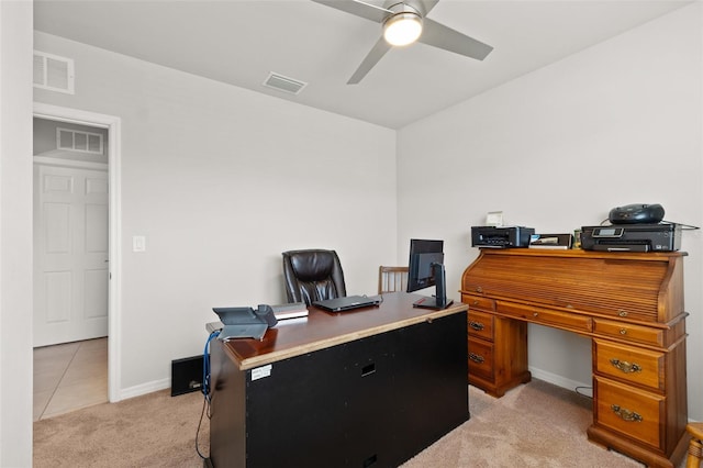 carpeted office with ceiling fan