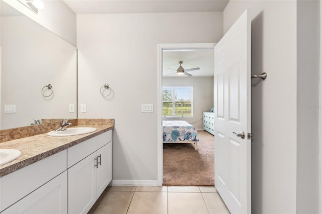 bathroom featuring tile patterned flooring and vanity