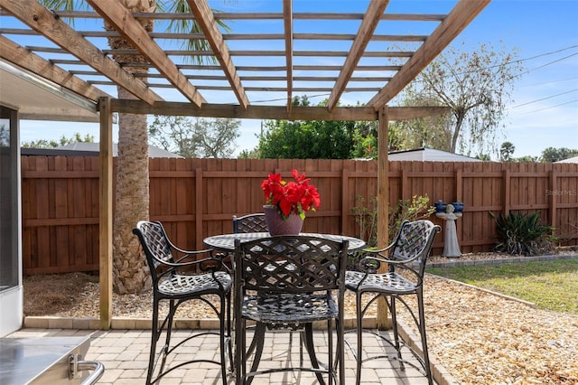 view of patio featuring a pergola