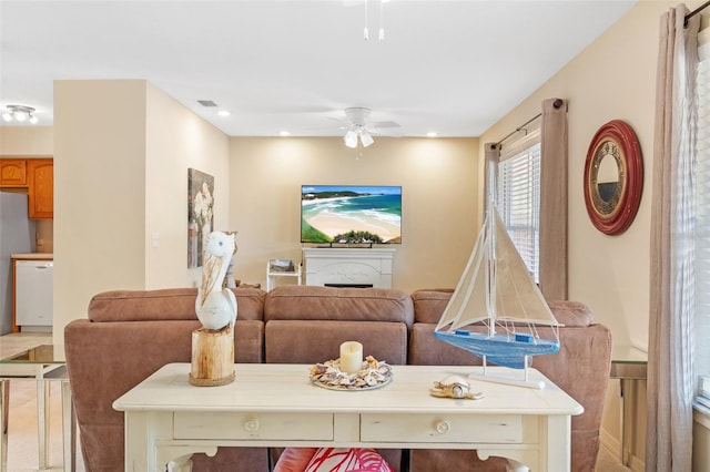 living room featuring ceiling fan