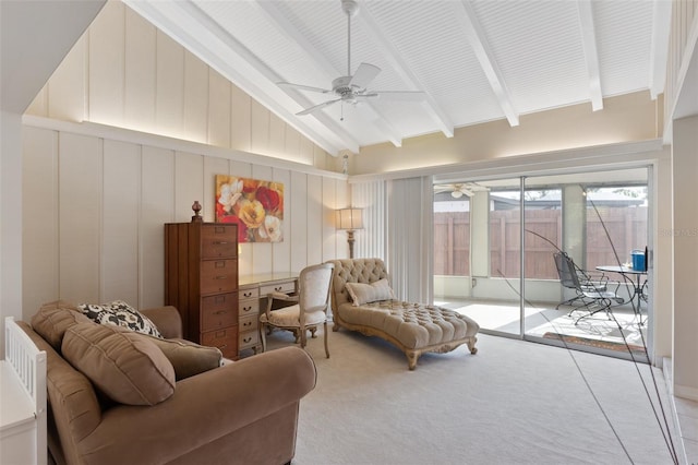 living area featuring carpet, beam ceiling, high vaulted ceiling, and ceiling fan