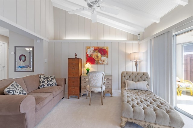 carpeted living room with lofted ceiling with beams and ceiling fan