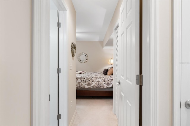 bedroom featuring light carpet