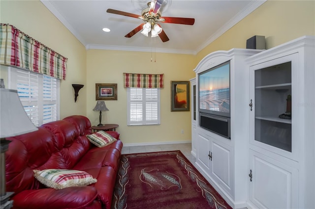 living room featuring crown molding, ceiling fan, and light tile patterned flooring