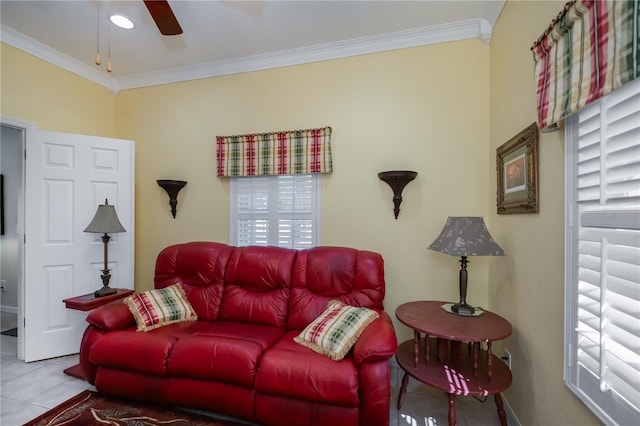 living room featuring crown molding, ceiling fan, and tile patterned floors