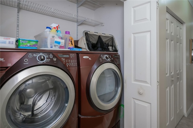 laundry area with separate washer and dryer