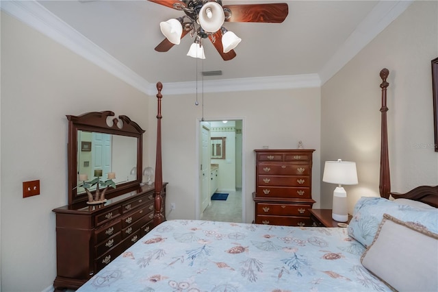 bedroom featuring ornamental molding, ceiling fan, and ensuite bathroom