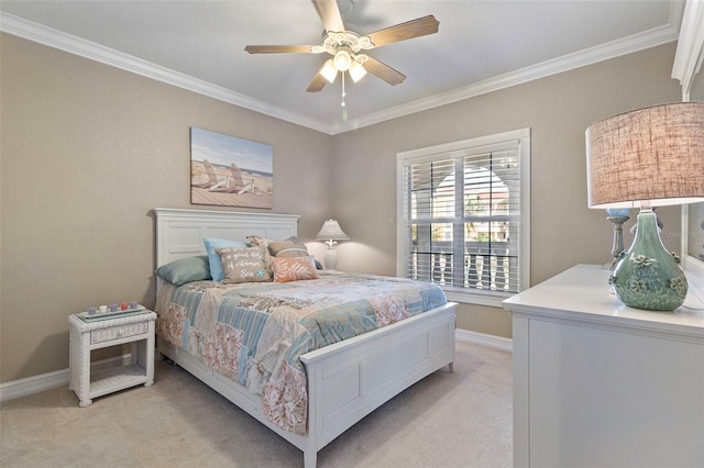 carpeted bedroom with crown molding and ceiling fan