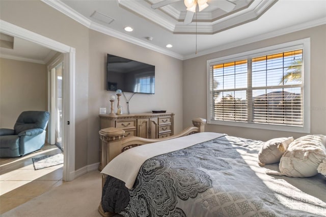 bedroom featuring ceiling fan, light colored carpet, crown molding, and a raised ceiling