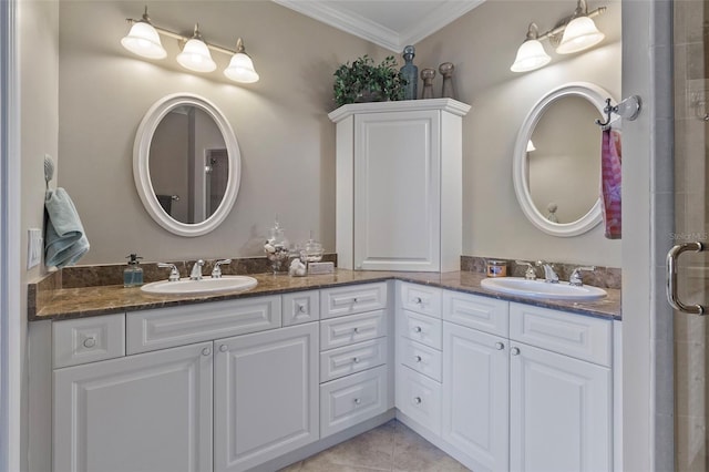 bathroom featuring tile patterned floors, vanity, and ornamental molding