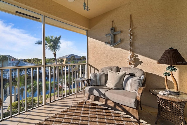 balcony featuring a water view