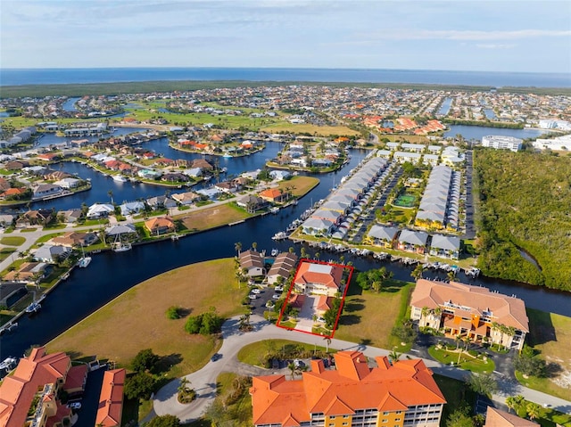 bird's eye view with a water view