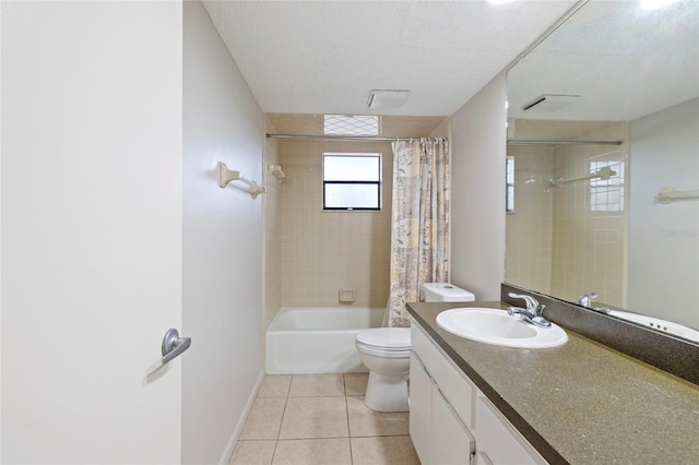 full bathroom featuring shower / tub combo with curtain, tile patterned floors, toilet, a textured ceiling, and vanity