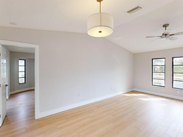 empty room featuring light hardwood / wood-style flooring and ceiling fan