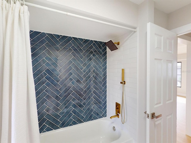 bathroom featuring shower / bath combo