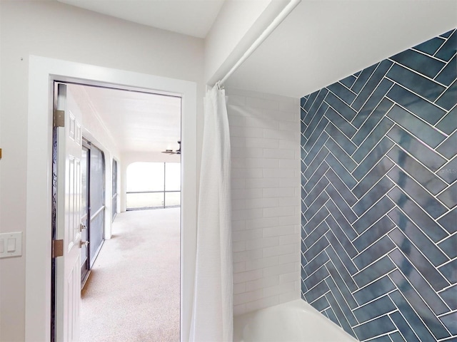 bathroom featuring shower / bath combo