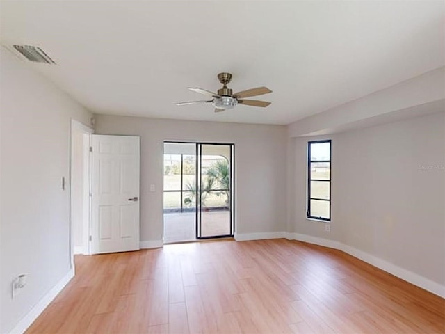 unfurnished room with light hardwood / wood-style floors and ceiling fan