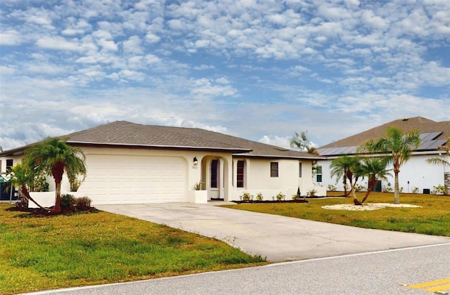 ranch-style house with a garage and a front yard