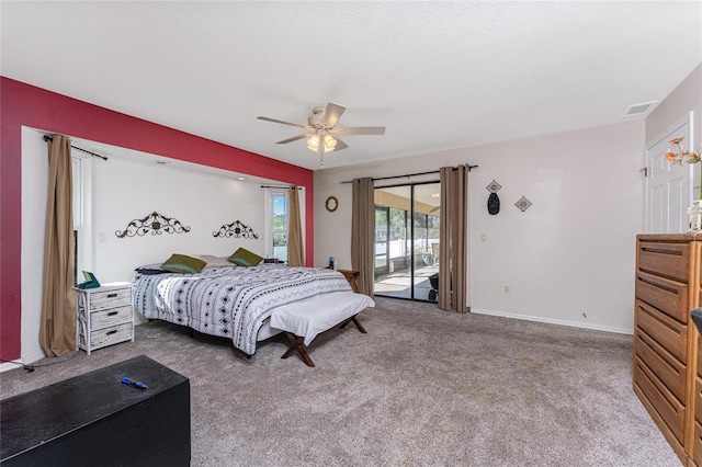 carpeted bedroom featuring access to outside and ceiling fan