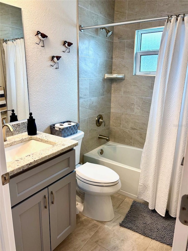 full bathroom featuring vanity, tile patterned flooring, toilet, and shower / tub combo with curtain