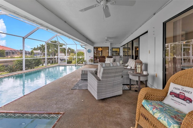 view of pool with an outdoor living space, a lanai, a patio, a bar, and ceiling fan