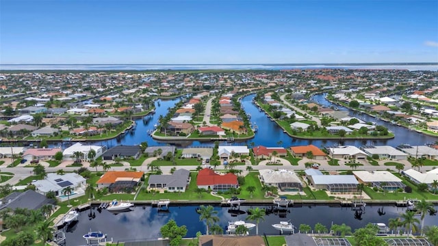 bird's eye view with a water view