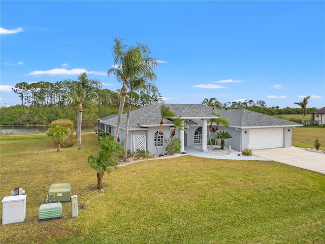 single story home featuring a garage, a water view, and a front yard